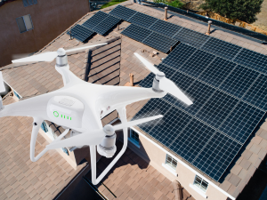 Eco-friendly roofing materials displayed by a roofer in Clayton, showcasing a variety of sustainable options like recycled shingles and solar tiles.