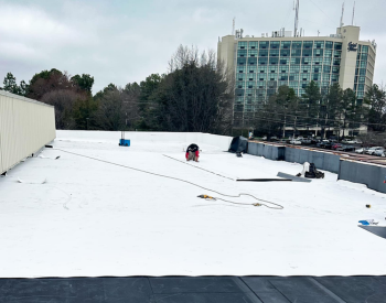 G3's commercial roofing team installing TPO roof in Raleigh NC